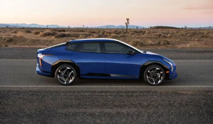 2026 Kia EV4 driving down road